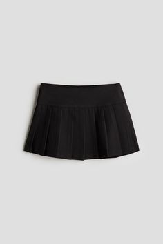 Skirt in twill. Adjustable  elasticized waistband  zipper at one side with concealed snap fastener  and a visible  horizontal seam on skirt with pleats. Unlined. School Uniform Style Skirt, Lined Skirt Skort For School, Cotton Skirted Skort With Lined Skirt, Casual Skirted Skort With Accordion Pleats, Lined Skort For School, School Uniform Lined Skirt, Casual Stretch Pleated Skirt With Accordion Pleats, Casual Stretch Accordion Pleated Skirt, Casual Accordion Pleated Skort