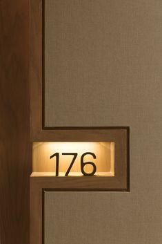 an illuminated door with the number seventy on it