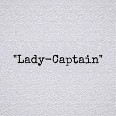 the word lady captain written in black ink on white paper