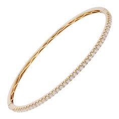 Introducing our versatile and elegant 1.00 Carat Diamond Bangle Bracelet in 18K Yellow Gold. This chic bangle is a true symbol of refined style and sophistication. Adorned with one carats of brilliant round diamonds, meticulously pavé set in 18K yellow gold, it radiates a mesmerizing sparkle from every angle. The timeless design of this bangle allows for effortless pairing with any outfit, whether for a formal event or a casual outing. Its sleek and slender silhouette adds a touch of elegance to Modern Bangle, Diamond Bangle Bracelet, Modern Bracelets, Diamond Bangles Bracelet, American Modern, Refined Style, Gold Bangle, Diamond Bangle, Diamond Gold