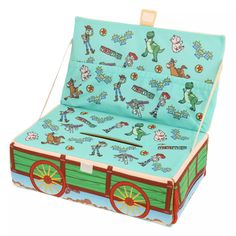 an open suitcase with cartoon characters on the front and sides, sitting on top of a white background