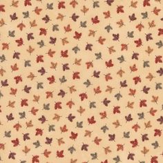 an orange and red leaf pattern on a beige background, with small leaves in the center