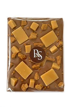 a chocolate bar with pieces of cheese and nuts on it's wrapper that says r & s