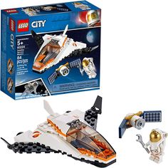 the lego city space shuttle is in its box