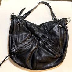 Lux! Large Black Supple Leather Mark New York Shoulder/Hobo/Cross Body Bag Is In New Condition. No-Scratches, Marks, Tears, Scuffs, Stains- Inside And Out! Was Only Used Once For Short Time. (Bag Was Too Heavy For My Shoulder And Never Used It Again But It’s Beautiful And I Just Held Onto It) Multiple Pockets On Front Zippered And Open And Two Large Open Pockets On Back. Inside Has One Zippered Pocket And Two Pouches To Hold Things. Very Large Capacity! Has Metal Hardware, Short Straps For Arm/S Everyday Hobo Bag With Palladium Hardware, Hobo Crossbody Bag, Marc New York, Have Metal, Metal Hardware, Cross Body Bag, Hobo Bag, Body Bag, Large Black