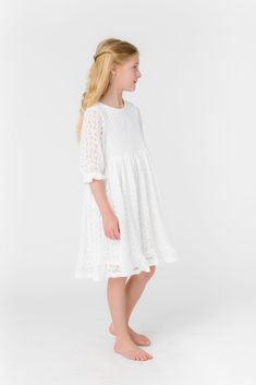 All over lace girl's dress 1/2 length sleeves Round neckline Gathered waist Button back closure Fabric content - Cotton - Dry clean only Short Sleeve Lace Dress For Confirmation, Short Sleeve Lace Confirmation Dress, Spring Dresses With Lace Short Sleeves, Spring Confirmation Lace Dress, Spring Lace Dress For Confirmation, Spring Lace Dress With 3/4 Sleeves, Lace Dress With 3/4 Sleeves And Lace Trim, Lace Dresses With Half Lace Sleeves, Summer Dress With Lace Trim And 3/4 Sleeves