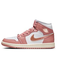 The Air Jordan 1 Mid SE 'Red Stardust' features a classic silhouette with a soft, dusty rose colorway.  The tumbled leather upper is accented with shiny copper details on the Swoosh, Wings logo, and lace dubraes.  This comfortable sneaker offers Air cushioning and a durable outsole with star-shaped traction. Jordan 1 Mid Pink, Air Jordan 1 Mid Gs, Original Air Jordans, Air Jordan 1 Mid Se, Nike Air Jordan 1 Mid, Sea Coral, White Sea, Air Jordan 3, Nike Air Jordan 1