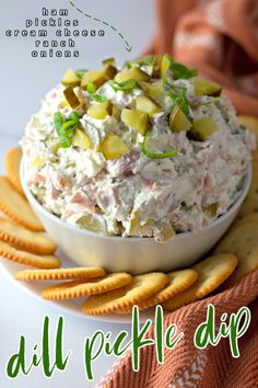 a white bowl filled with potato salad on top of crackers