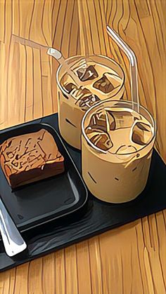 two desserts on a black tray with forks and spoons next to each other