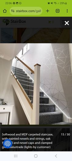 the stairs and railings in this house are all white with grey carpeting on them