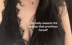 a woman with long black hair has a quote on her chest that says, life really reward the woman that proprifies herself