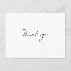 a thank card with the words, thank you in cursive writing on it