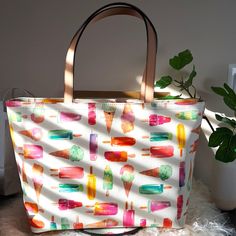 Nwots Kate Spade Ice Cream Francis Tote. A Sturdy Kate Spade New York Tote Styled With A Playful Popsicle Print. The Top Zip Opens To A Lined Interior With 3 Pockets. Slim Handles. Dustbag Included Fabric: Faux Leather Height: 11in / 28cm Length: 13in / 33cm Depth: 6.25in / 16cm Handle Drop: 8.25in / 21cm Kate Spade Summer Shopping Bag, Kate Spade Summer Travel Shoulder Bag, Summer Kate Spade Bags For Daily Use, Kate Spade Shoulder Bag For Everyday Summer Use, Kate Spade Summer Shoulder Bag For Everyday, New York Tote, Bags Kate Spade, Kate Spade Bags, Kate Spade Bag