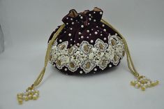 Stone Royal white Handcrafted pearl beaded clutch portly bag, Embroidered Potla Bag, Handbag, Wedding Purse, Wedding Gifts, Bridesmaid Gift Multi-function: Velvet is used on the inside to keep your belongings safe. - Magnetic lock closure easy to open and off. - Removable golden sling chain (would not pull your hair and dress) - Designer Dragon clasp. it can make the clutch to be a handbag cross body bag or shoulder bag. This statement clutch is a true example of exquisite Indian craftsmanship. It is handmade with love by our local Indian artisans.  - Front and back same as is design Dimension: Professional size.      lenth.c.m.        | wirth.c.m.              | hightc.m.       Weight approx.                     KG. Space inside:        Your daily belongings and cell mobile, keys, cards, White Embroidered Potli Bag For Evening, White Embroidered Evening Bag For Reception, Formal White Embroidered Bags, Formal White Embroidered Bag, Handheld Pearl Embroidered Evening Bag For Weddings, Handheld Pearl Embroidery Evening Bag For Wedding, White Embroidered Clutch For Reception, White Embroidered Clutch For Receptions, Handheld Evening Bag With Pearl Embroidery For Wedding