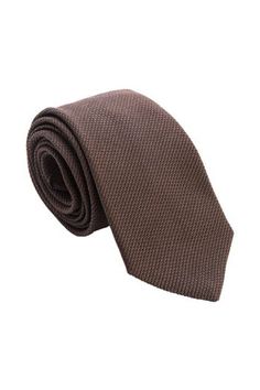 Embrace classic elegance with this dark chocolate brown grenadine tie that will give your look understated sophistication and will make a lasting impression. Standard Length: Approx. 3.25" x 58.5". A classic tie width and length that is perfect for most men up to 6'2". 100% silk grenadine garza fina: Garza fina (fine gauze) is a loose weave fabric made from high-twist yarns. It has a slightly knobby texture. Tipped with our signature pinstripe silk: Not only is it a refined finishing touch, it k Classic Brown Ties For Office, Brown Standard Tie For Business, Luxury Brown Suit And Tie Accessories For Semi-formal Occasions, Dapper Brown Tie For Business, Elegant Brown Suit And Tie Accessories For Business, Luxury Brown Suit And Tie Accessories For Business, Brown Semi-formal Standard Tie, Dapper Brown Suit And Tie Accessories For Semi-formal Occasions, Classic Brown Fitted Suit And Tie Accessories