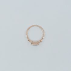 The Maggey ring is like an old soul, a classic beauty with hints of the modern woman. This up-to-date vintage inspired ring can be worn as an alternative engagement ring, or as an everyday ring. Details: 14k gold (available in rose, white or yellow gold)Emerald cut Blue Sapphire is 5.5mm x 4mm Tapered diamond baguettes about 2.5x1.4mm Also available in Green and Pink Tourmaline (please see other listings) Free Shipping on Domestic Orders Materials: Sapphire, diamond, 14k gold, blue sapphire Need