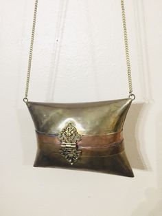 "Vintage brass purse. This is very unique,I love the pillow style. Perfect for a boho decor or fashion! I believe it may be from India.great for a little international flair! It is very ornate and very intricate workmanship. Lined with blue velvet. All solid brass. Size ---6\" x 4\" x 2.5\"" Gold Metal Clutch For Gift, Vintage Gold Shoulder Bag Handmade, Bohemian Rectangular Shoulder Bag For Formal Occasions, Handmade Bohemian Gold Clutch, Bohemian Handmade Gold Clutch, Handmade Gold Clutch For Festivals, Victorian Gold Bag As Gift, Handmade Victorian Gold Bags, Formal Bohemian Rectangular Shoulder Bag