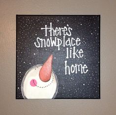 there's snowplace like home painted on the wall in front of a door