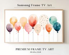 the samsung frame tv art is displayed in front of a wall with balloons on it