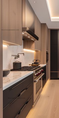 a kitchen with wooden cabinets and stainless steel appliances, including an electric range top oven