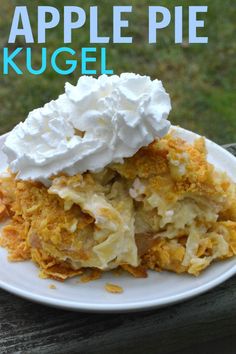 an apple pie with whipped cream on top is sitting on a white plate and has the title above it