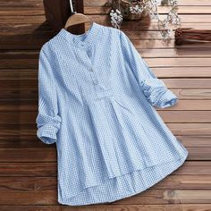 Pattern: PlaidFabric name: cotton blendProduct Category: ShirtSleeve type: regular sleeveCollar type: Stand CollarSleeve length: long sleeve  USUK/AUSEURBustLengthSleeve LengthCMinchCMinchCMinchS4-6103610039.37 6726.38 5822.83 M8-10123810541.34 6826.77 5923.23 L12-14144011043.31 6927.17 6023.62 XL16-18164211545.28 7027.56 6124.02 XXL20-22184412047.24 7127.95 6224.41 3XL24-26204612549.21 7228.35 6324.80 4XL28-30224813051.18 7328.74 6425.20 5XL32-34245013553.15 7429.13 6525.59 Casual Long Sleeve Cotton Blouse, Long Sleeve Plaid Blouse For Summer, Blue Tops With Roll-up Sleeves For Spring, Long Sleeve Shirt With Roll-up Sleeves For Fall, Light Blue Long Sleeve Shirt With Pockets, Light Blue Collared Cotton Shirt, Fall Cotton Blouse With Pockets, White Long Sleeve Cotton Blouse, Fall Light Blue Shirt With Pockets