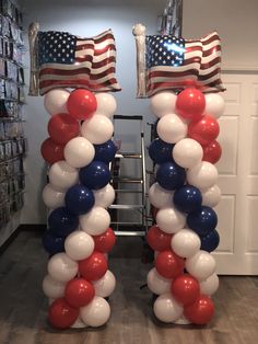 balloons are arranged in the shape of an american flag