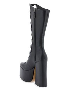 The Kiki Knee-High Boots by Marc Jacobs crafted in leather and featuring adjustable straps, cut-out details and maxi heel and platform. Leather lining and leather sole. Size Info IT Color Detail Black Made In China Material 100% cow leather Season One spring Season Two summer Product shoes Brand Marc Jacobs Size And Fit Heel Height = 16 cm High Cut Faux Leather Heeled Boots, Edgy Leather Platform Boots, Knee-high Platform Boots In Faux Leather, Edgy High-cut Leather Platform Boots, Leather Knee-high Platform Boots With Sculpted Heel, Leather Mid-calf Boots With Chunky High Heel, Leather High Heel Mid-calf Boots With Chunky Platform, High Cut Platform Boots In Faux Leather, Party Platform Boots With Lug Sole In Faux Leather