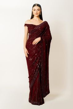 Ox blood georgette saree with sequins hand embroidery. Comes with a off-shoulder blouse.
Components: 2
Pattern: Hand embroidered
Type Of Work: Sequins
Neckline: Off Shoulder
Sleeve Type: Sleeveless
Fabric: Georgette
Color: Red
Other Details: 
Closure: Blouse - Back hooks
Occasion: Wedding - Aza Fashions Long Sleeve Saree Blouse, Aesthetic Saree, Red Saree, Georgette Saree, Blouse For Women, Work Sarees, Blood Red, Saree With Blouse, Blouse Online