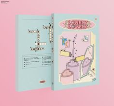 the book is open to show an image of a bathroom with pink and blue walls