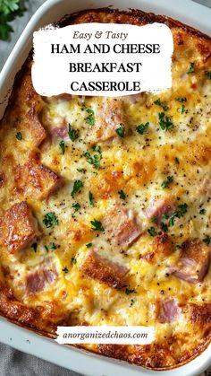 ham and cheese breakfast casserole in a white dish with parsley on top