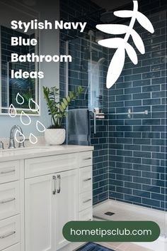 a bathroom with blue tiles and white cabinets in the shower area is featured for stylish navy, blue bathroom ideas