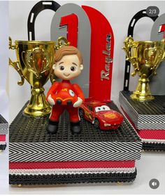 two photos of cars and trophies on top of each other with the number one next to them