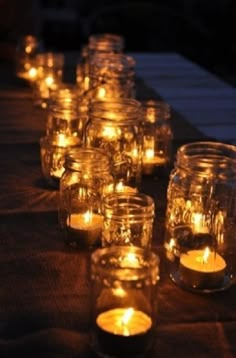 candles are lined up on a table with the words, via your home based mom