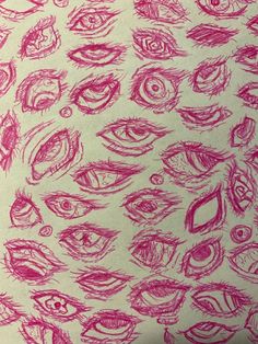 a drawing of many different types of eyeballs on white paper with pink marker pens