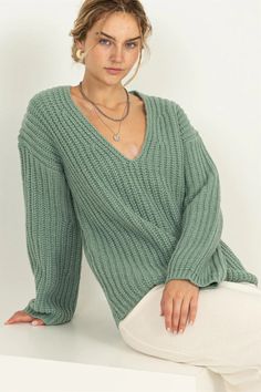 This chunky sweater features a ribbed design, boasting a timeless v-neck, drop shoulders and long wide sleeves. Relaxed-fit bodice. Material: 79% POLYESTER / 21% ACRYLIC MODEL IS 5' 9" TALL, 32" CHEST, 23" WAIST AND 35" HIPS AND WEARING A SIZE SMALL Green V-neck Sweater For Fall, Trendy Chunky Knit V-neck Long Sleeve Sweater, Fall Chunky Knit V-neck Sweater, Spring Cable Knit V-neck Sweater, Oversized V-neck Cropped Sweater For Spring, Oversized Green V-neck Sweater, Casual Chunky Knit Cropped V-neck Sweater, Casual V-neck Chunky Knit Cropped Sweater, Casual V-neck Cropped Sweater In Chunky Knit