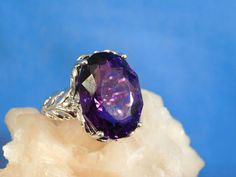 We offer free sizing, free shipping in the USA only, and a free appraisal upon request. If you are an international buyer, please contact us to work out shipping price. Also, we do not pay customs fees. Thanks. February Birthstone Sku: MJ1008 This is a 19.37 ct. Octagonal Amethyst gemstone ring. This is a natural Amethyst in an Art Deco style sterling silver .925 setting. The ring was made in the USA by our staff gemologist and jeweler. Every ring is unique and one of a kind. The beautiful Ameth Octagon-shaped Amethyst Ring For Formal Occasions, Octagon Amethyst Ring For Formal Events, Octagon Amethyst Ring For Formal Occasions, Formal Octagon Amethyst Ring, Elegant Engraved Amethyst Ring As Gift, Elegant Engraved Amethyst Ring For Gift, Classic Octagon Amethyst Ring As Gift, Classic Octagon Amethyst Ring As A Gift, Octagon Amethyst Ring With Prong Setting Gift