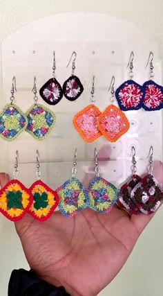 Crochet granny square earrings made with silver backs and made with love! About an inch wide and an inch in length. Styles range fro Fourth of July, Rasta and different color variations!  All sales are final, unless damaged through transit and returned. Handmade Square Earrings For Gift, Handmade Square Jewelry As Gift, Handmade Square Jewelry Gift, Multicolor Square Jewelry For Gifts, Multicolor Square Jewelry Gift, Handmade Square Bohemian Earrings, Handmade Bohemian Square Earrings, Handmade Multicolor Square Earrings, Handmade Colorful Earrings For Crafting