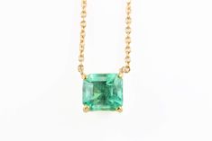 Featured here is a 1.32-carat stunning, Colombian emerald necklace in fine 14K yellow gold. Displayed in the center is a medium-light green emerald with incredible crystal clarity, accented by a simple four-prong gold mount, allowing for the emerald to be shown in full view. The earth mined, green Colombian emerald has a desirable lush green color with excellent qualities. An 18 inch is attached to the emerald pendant. This necklace is ideal for everyday use and is the perfect accessory to any o Elegant Diamond Cut Emerald Necklace For May Birthstone, Elegant Diamond Cut Emerald Necklace, Elegant Emerald Necklace With Diamond Cut, Exquisite Green Necklace With Brilliant Cut, Timeless Emerald Necklace With 17 Jewels For Gift, Timeless Emerald Necklace As Gift, Elegant Green 14k Gold Necklace, Elegant Green Necklace With Prong Setting, Exquisite May Birthstone Necklace For Formal Occasions