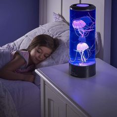 The Jellyfish Aquarium features 5 LED color options: Red, Green, Blue, Purple, and Pink. Pick the color that matches your home's personality, or let the auto color-switching function do the magic for you!? Create a "Peace of Mind" atmosphere by switching the Aquarium on. Even the most energetic kids will not be able to resist its calming atmosphere! Simply add distilled or tap cold water into the tank, put the jellyfish in, plug it into a USB port or insert 3 AA batteries, and press the ON butto Desktop Aquarium, Aquarium Lamp, Jellyfish Illustration, Jellyfish Tank, Jellyfish Photography, Jellyfish Aquarium, Jellyfish Light, Jellyfish Lamp, Jellyfish Craft