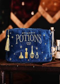 a harry potter bag sitting on top of a wooden table