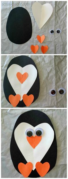 the penguin is made out of paper and has hearts on it