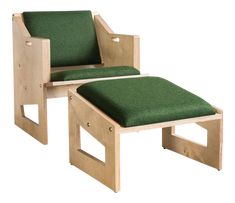 a wooden chair with a green seat and footstool sitting next to each other