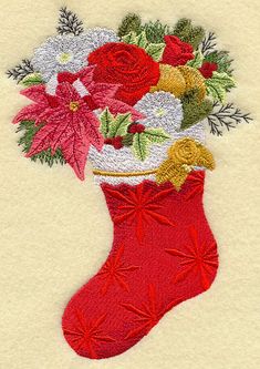 a christmas stocking with flowers in it