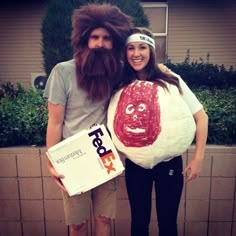 a man and woman are dressed up as people with fake hair, beards and mustaches