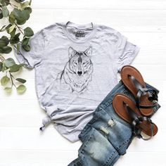 Wolf Graphic Shirt, Wolf Design Shirt, Wolf Shirt, Family Shirts, Wolf Family Shirt, Wolf Lover Shirt, Gift for Wolf Lover, Cute Animal Tee, Wolf Graphic Tee, Howling Wolf T-Shirt, Animal Print Nature Shirt, Wolf Lover Shirt, Lone Wolf T Shirt, Wolf Spirit Animal Outfit HI! Welcome to my store, I'm delighted to see you here. My store's main goal is to provide you with premium everyday apparel with the best graphic t-shirts. I see you as a friend, not just a customer. I'm sure you'll love my desi Wolf Design Graphic Tee With Short Sleeves, Graphic Tee With Wolf Design, Short Sleeve, Graphic Tee With Wolf Design Short Sleeve, Animal Outfit, Wolf Family, Wolf Graphic, Wolf Spirit Animal, Wolf Shirt, Howling Wolf