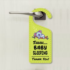 a baby sleeping tag hanging on a door handle that says, sunny baby sleeping thank you