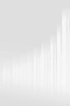 an abstract white background with vertical lines in the center and one line at the bottom