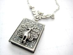 Peacock Locket Necklace Book Locket Necklace Bird by iceblues, $24.00 Nickel-free Pewter Necklaces As Gift, Nickel-free Pewter Necklace For Gift, Antique Silver Pendant Locket Necklace Gift, Antique Silver Pendant Locket Necklace For Gift, Antique Silver Charm Necklace Gift, Antique Silver Pendant Locket Necklace As A Gift, Antique Silver Charm Necklaces For Gift, Antique Silver Charm Necklace For Gift, Antique Style Silver Charm Necklaces For Gift