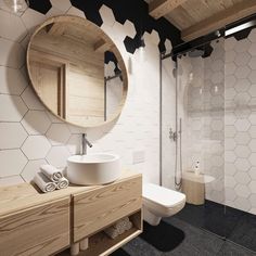 a bathroom with white tile and wooden accents